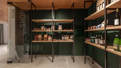 Modern small shop with shelves stocked with food and drinks